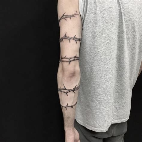Amazing Rose Thorns Armband Tattoo Design With Black Color For Guys In