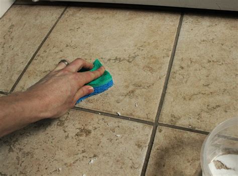 In a bucket or large bowl, mix together 2 to 4 parts water and 1 part distilled white vinegar. DIY Natural Tile or Grout Cleaner
