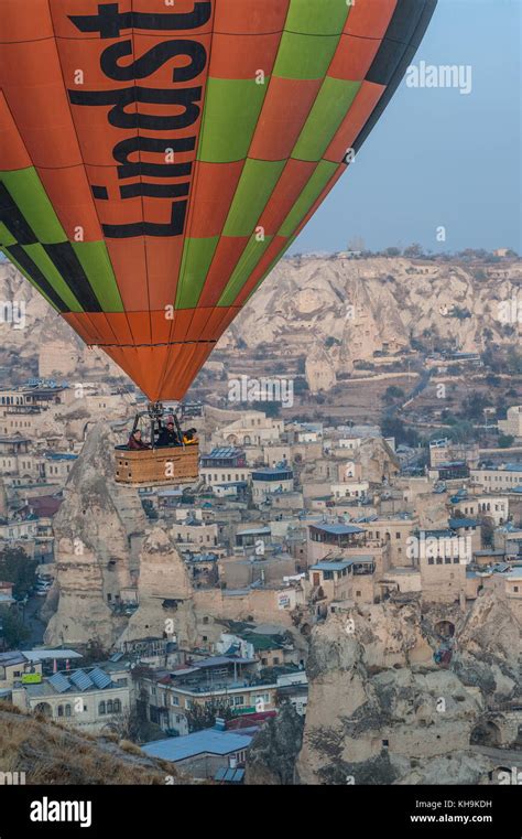 Balloons Rise At Dawn Over Cappadocia Stock Photo Alamy