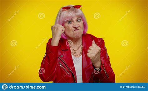Aggressive Angry Senior Granny Woman Trying To Fight At Camera Shaking