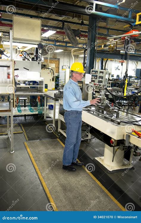 Man Working In Industrial Manufacturing Factory Stock Photo Image