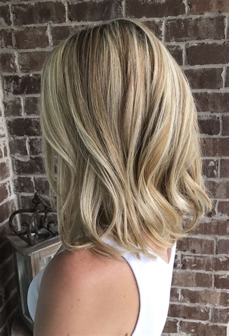 Golden And Honey With Platinum Blonde Highlights Long Angled Bob