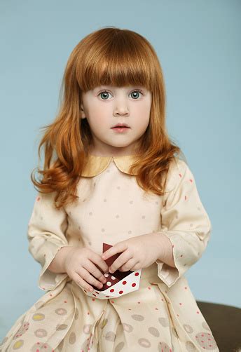 Portrait Of Beautiful Redhead Little Girl Stock Photo