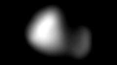 The moon also has a strangely reflective surface. Pluto's moon Kerberos finally shows itself - BBC News