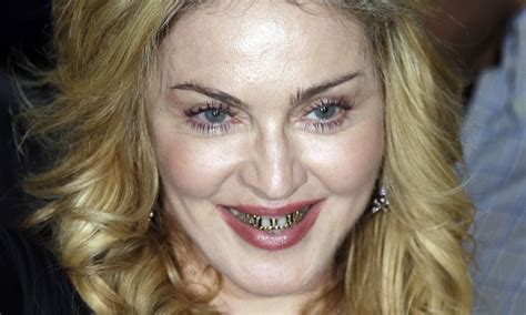 Madonna Shows Off Gold Teeth Grills As She Visits Hard Candy Fitness