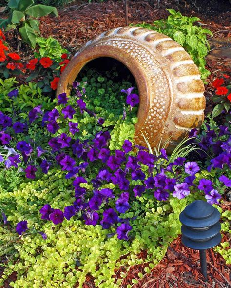 22 Best Spilled Flower Pot Ideas And Designs For 2023