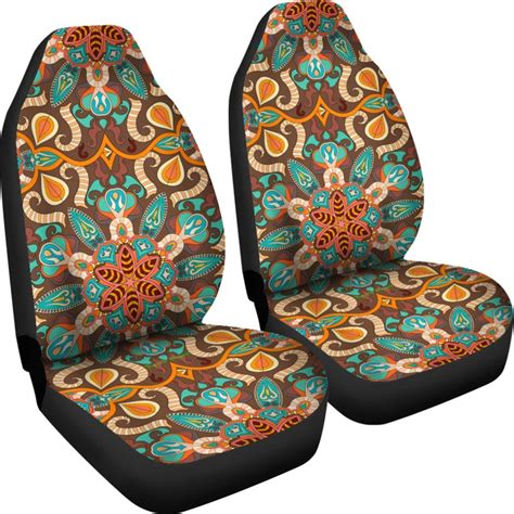 two car seats with colorful paisley designs on the front and back both facing each other