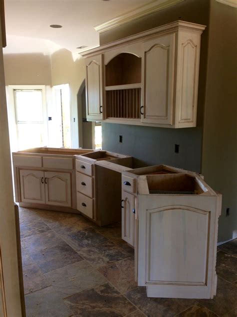 White kitchens and oak wood, this is one of the most current trends in the world of interior design and. Pickled Stain with Warm Brown Glaze. This is the sink and ...