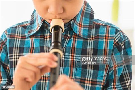 Boy Playing Recorder Photos And Premium High Res Pictures Getty Images