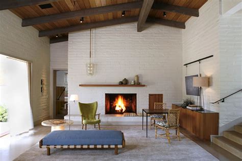 The drawback of premature indoor fire pits was that they generated toxic and/or irritating smoke within the. Mid-century Modern Renovation (With images) | Modern fireplace mantels, Modern stone fireplace ...