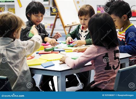 Group Of Diverse Students At Daycare Stock Image Image Of Wooden