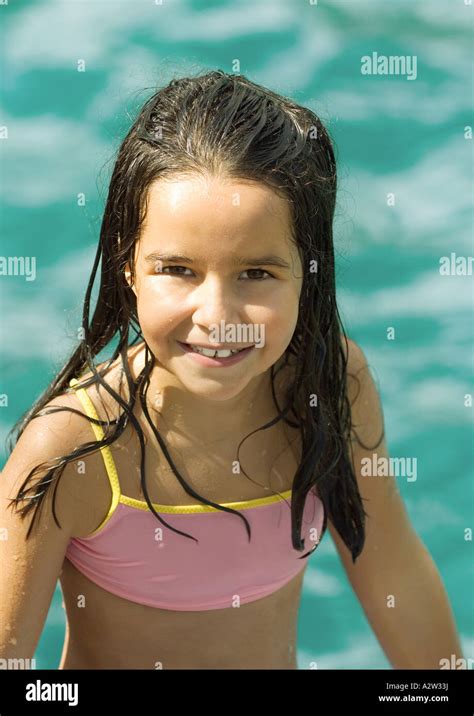 Girl In Bathing Suit Water In Background Portrait Stock Photo Alamy