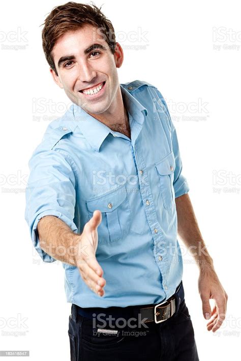 Enthusiastic Young Man Offers Hand Stock Photo Download Image Now