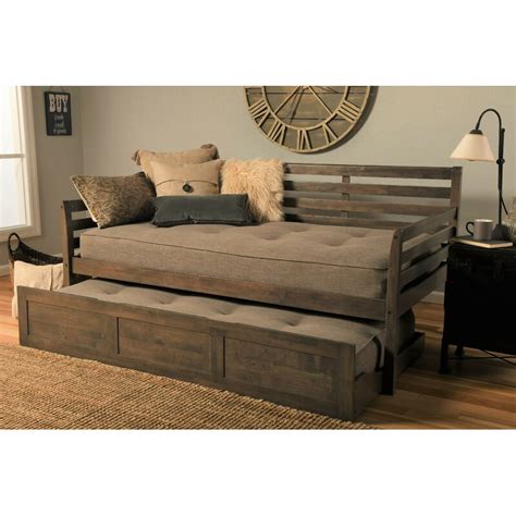 A trundle bed is a secondary bed that is usually stored below a standard bed that can be rolled out additional features. Ebern Designs Varley Twin Daybed with Trundle and Mattress ...