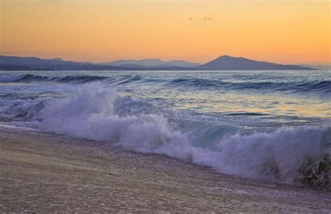Panoramio Photo Of Waves Crashing Down On Ilbarritz Beach At Sunset