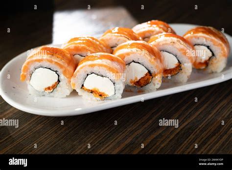 Traditional Delicious Sushi Roll Set On A White Plate Sushi Roll With
