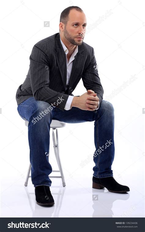 The Guy Sitting On A Chair Sitting Pose Reference Sitting Poses