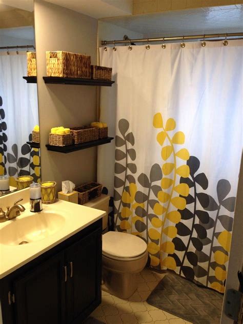 A yellow rug or a set of pillows can give a very special and modern twist to simple interiors. Brown and Yellow Bathroom Inspirational Decorating with Bathroom towels in 2020 | Yellow ...