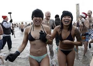 New Years Revelers Find Perfect Way To Chill With An Icy Plunge In