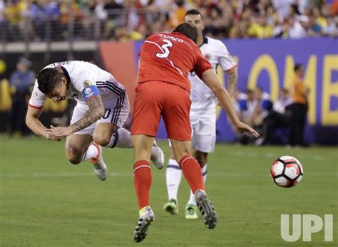 Photo Aldo Corzo And James Rodriguez Of Colombia Leap For A Header