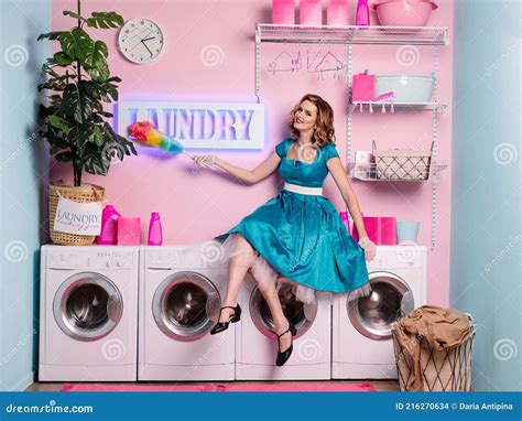 Beautiful Happy Housewife Wipes The Dust Woman In Retro 60s Pin Up Style In The Laundry Home