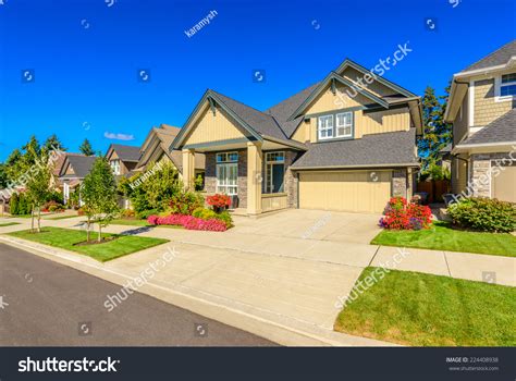 A Perfect Neighborhood. Houses In Suburb At Spring In The North America