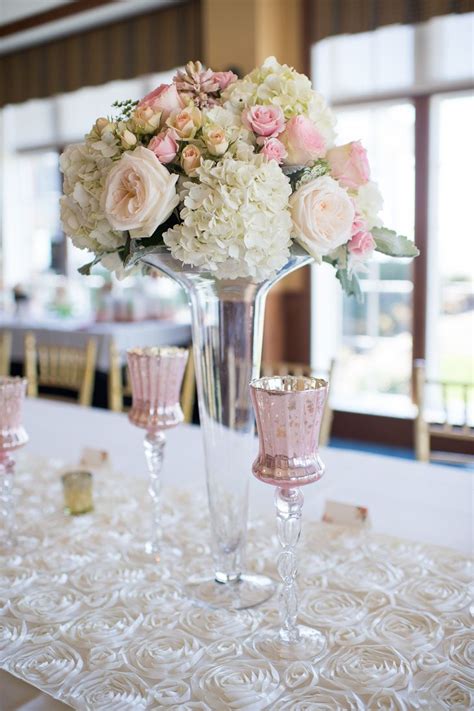 You can mist the flower. Tall Glass Vases with Spring Bouquets of Roses and ...