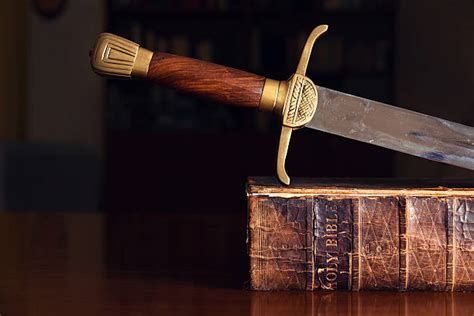 Old Bible With Sword Stock Photos Pictures And Royalty Free Images Istock
