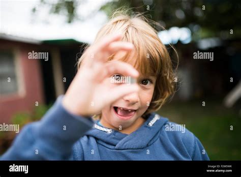 Portrait Of Little Boy Making Faces Stock Photo Alamy