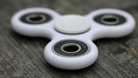 the science and benefits behind fidget spinners evolving science