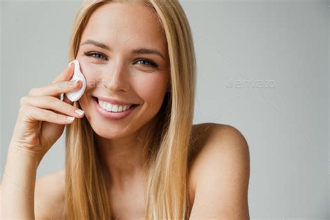 Half Naked Blonde Woman Laughing While Using Cotton Pad Stock Photo By