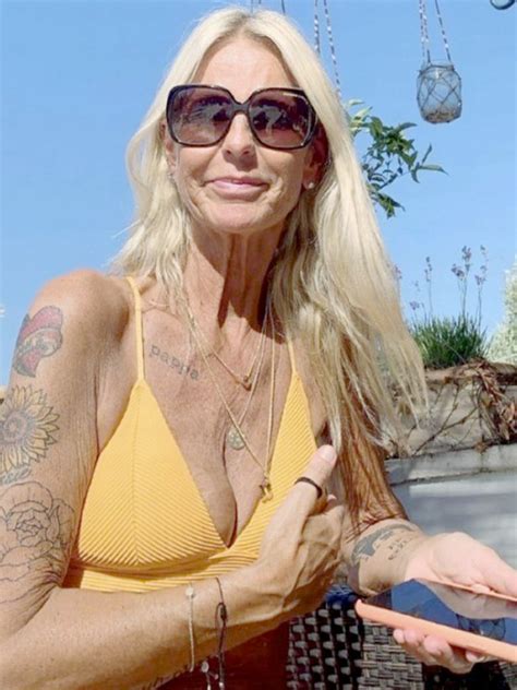 Ulrika Jonsson Sizzles As She Shows Off Tattoos In Skimpy Yellow Bikini