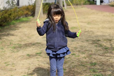 Japanese Girl Playing With Jump Rope Stock Photo Image Of Outdoor Playground