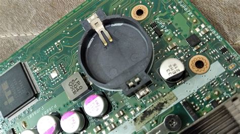 How To Firmly Place Cmos Battery On Asus X200ma Laptop Motherboard