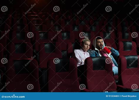 Young Romantic Couple Watching Movie In Theater Stock Image Image Of
