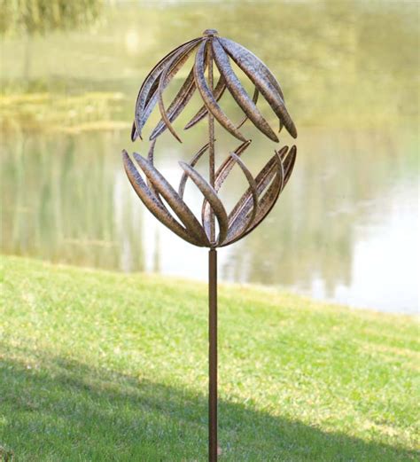 Dual Horizontal Motion Metal Wind Spinner With Antiqued Bronze Finish