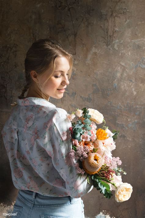 Download Premium Image Of Woman Holding A Bouquet Of Flowers 1207116 Flowers Bouquet Girls