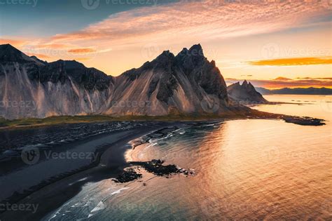 Beautiful Sunrise Over Vestrahorn Mountain And Black Sand Beach In