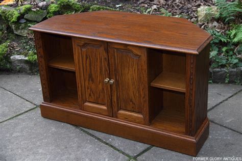Check spelling or type a new query. A JAYCEE AUTUMN GOLD CARVED OAK CORNER TV CABINET / STAND ...