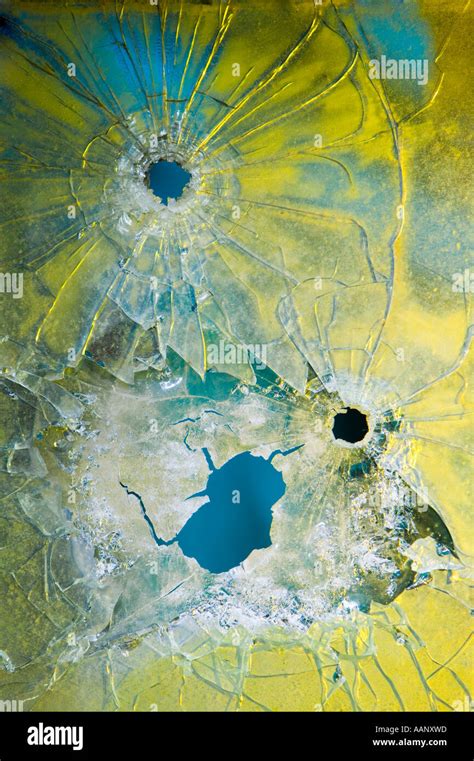 Bullet Holes In Fractured Glass Hi Res Stock Photography And Images Alamy