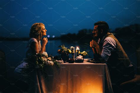 Lovely Couple Dining By Candlelight Couples Dining Romantic