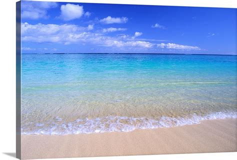 Clear Shoreline Ocean Water Turquoise Horizon Blue Sky With Clouds