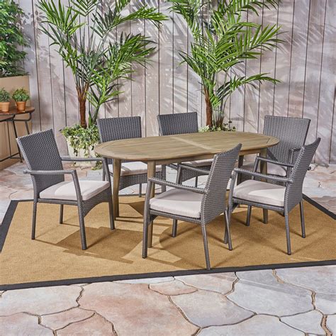 Stanfer Outdoor 7 Piece Acacia Wood Dining Set With Wicker Chairs In