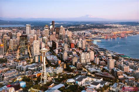 Aerial View Of Seattle Downtown And The Great Wheel At Sunset Usa