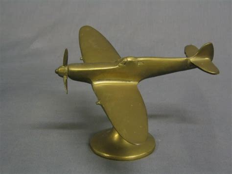A Brass Model Of A Spitfire In Flight 6 15th December 2004 Denhams