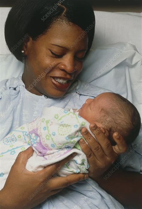 Mother holding her premature baby - Stock Image - M820/0326 - Science ...