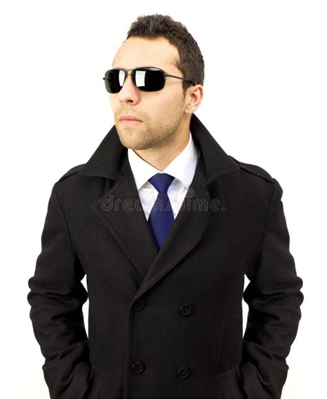 Portrait Of A Serious Standing Man With Sunglasses Stock Photo Image