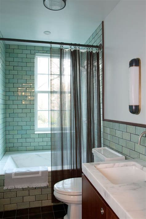 Кирпичная кладка, симметричные окна с белыми ставнями и аккуратные клумбы. 33 Bathroom Tile Design Ideas - Unique Tiled Bathrooms