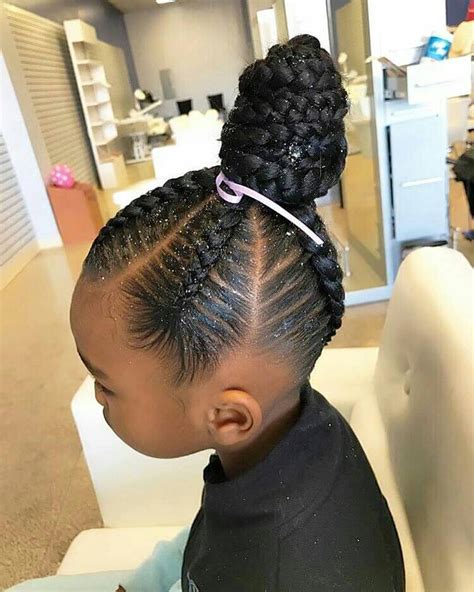 However, rather than one large bun sitting at the top of the head, we've got two buns on the sides instead. 21 Cutest Kids & Hairstyle Ideas Photo Gallery #3 - Black Hair OMG!