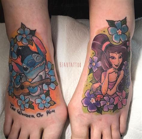 Two People With Tattoos On Their Feet And One Has An Image Of The Same